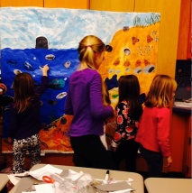 5th grade students share the coastal mural with their Kindergarten buddies.